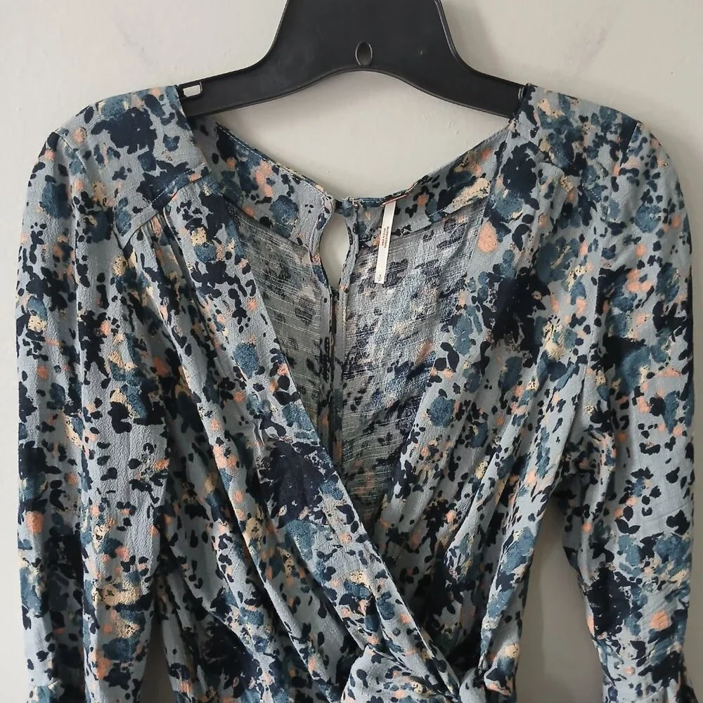 Free People Size S All the Right Ruffles Blue Floral Romper Flutter Sleeve Vneck